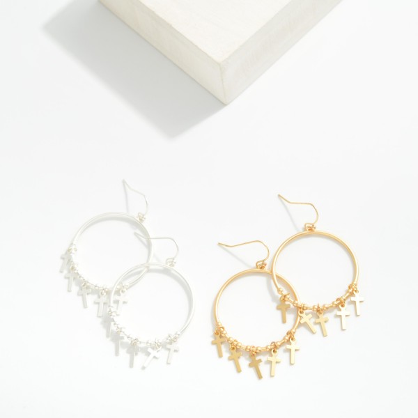 Metal Tone Hoop Drop Earrings Featuring Cross Charms 

- Approximately 2" L