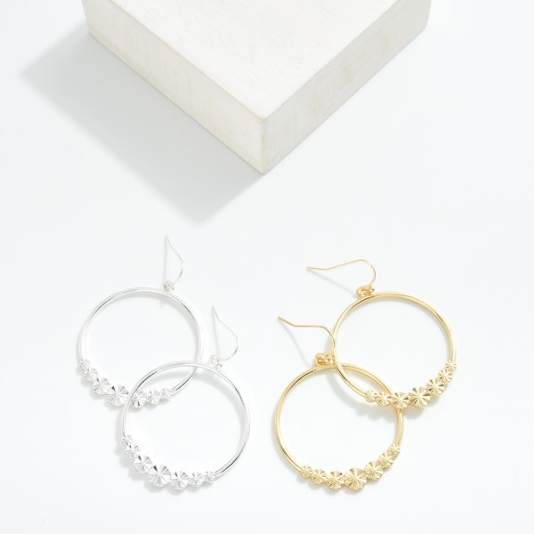 Metal Tone Hoop Drop Earrings Featuring Starburst Details 

- Approximately 2.25" L
