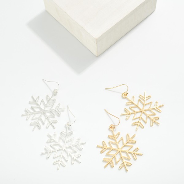 Simple Metal Tone Star Drop Earring

- Approximately 2" L


