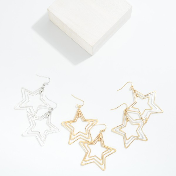 Nesting Metal Tone Stars Drop Earrings 

- Approximately 2" L