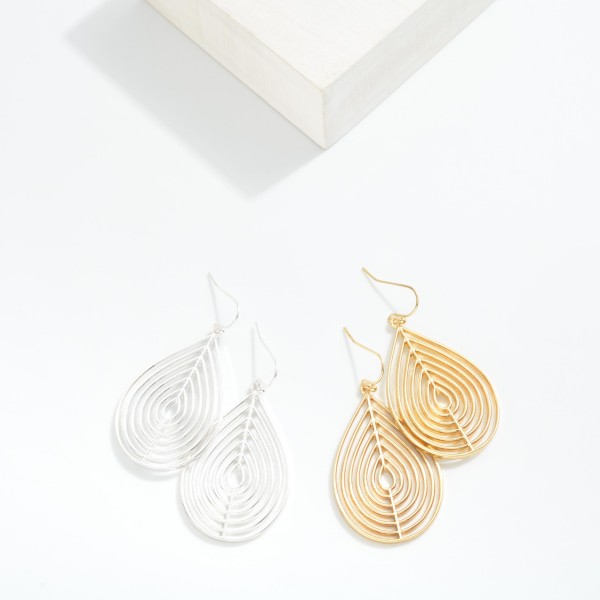 Metal Tone Teardrop Cut Out Drop Earrings 

- Approximately 2" L