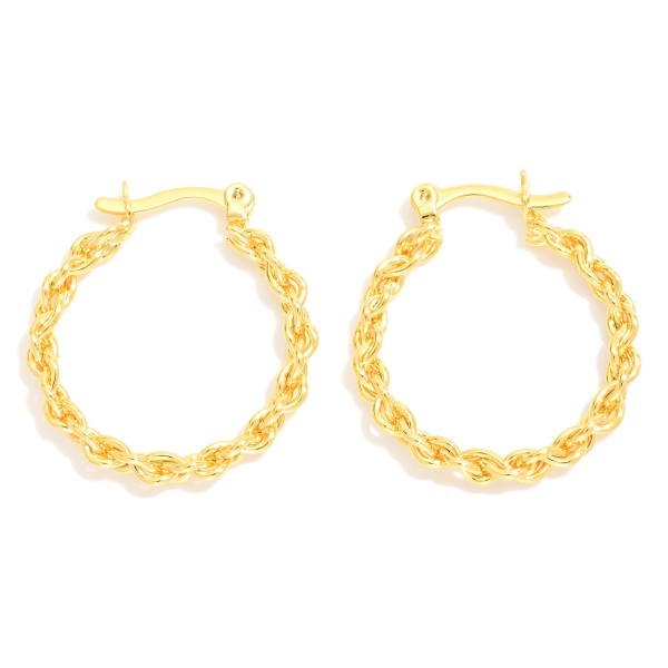 Braided Metal Tone Hoop Earrings

- Approximately .75" D
- 18k Gold Filled
- Hypoallergenic
- Made In Brazil

