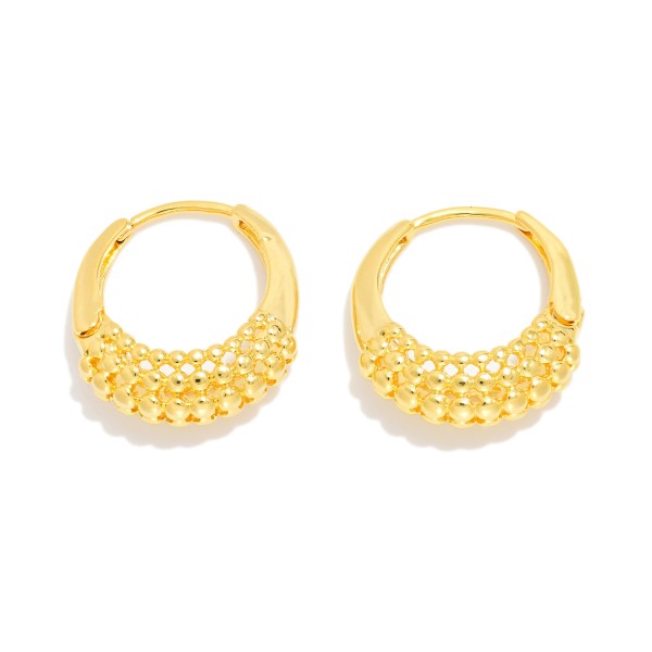 Metal Tone Hoop Drop Earring Featuring Textured Metal 

- Approximately .25" D
- 18k Gold Filled
- Hypoallergenic
- Made In Brazil