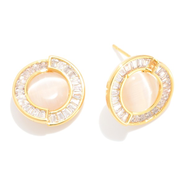 Baguette Studded Circle Post Drop Earring Featuring Pearl Detail 

- Approximately .25" D
- 18k Gold Filled
- Hypoallergenic
- Made In Brazil

