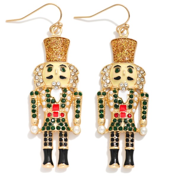 Metal Enamel Nutcracker Christmas Drop Earring Featuring Rhinestone, Pearl, And Glitter Detailing 

- Approximately 2.5" L