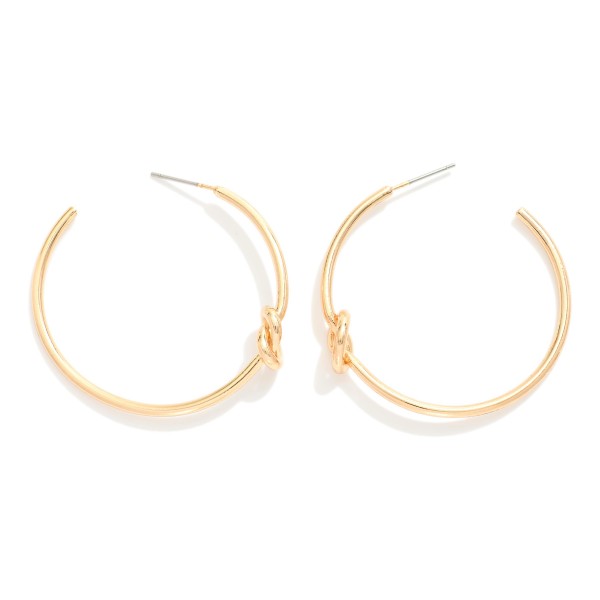 Metal Tone Knotted Hoop Earrings

- Approximately 1.25" D