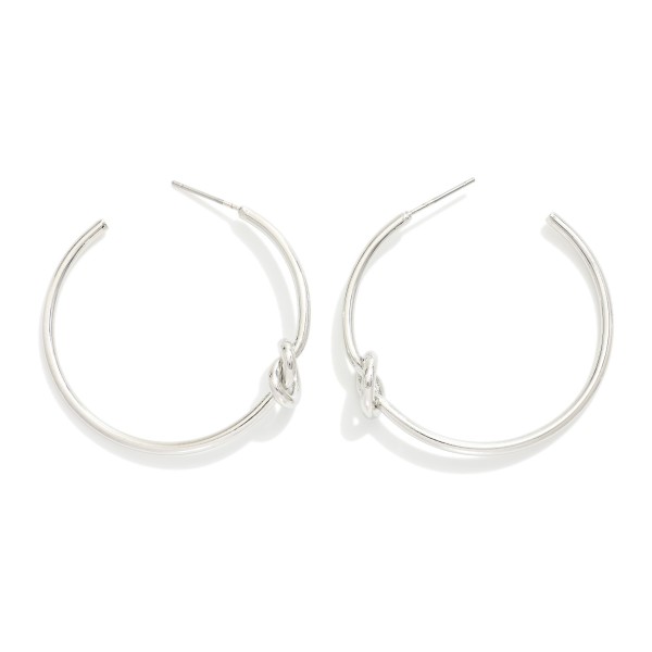 Metal Tone Knotted Hoop Earrings

- Approximately 1.25" D