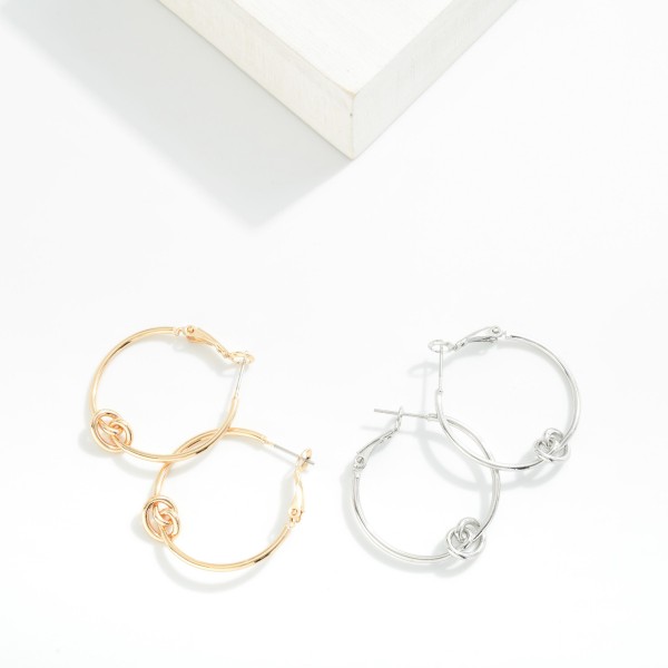 Metal Tone Knotted Hinged Hoop Earrings 

- Approximately 1" D