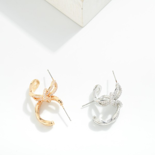 Metal Tone Intertwined Hoop Earrings Featuring Rhinestones & Knotted Metal Detail 

- Approximately .75" D
