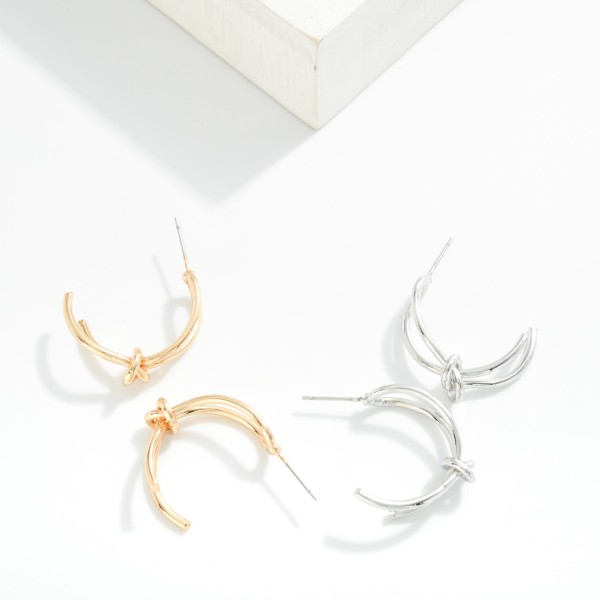 Knotted Metal Tone Half Hoop Earrings 

- Approximately 1" L