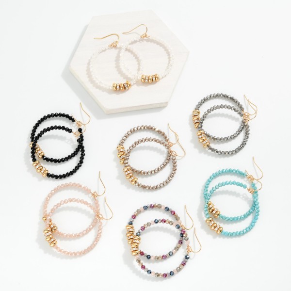 Faceted Beaded Hoop Drop Earring Featuring Gold Tone Rhinestone Studded Discs And Gold Tone Discs 

- Approximately 2" L

