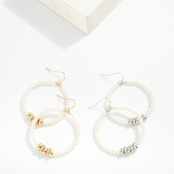 Pearl Hoop Drop Earrings Featuring Metal Tone Disc Charms With Rhinestones 

- Approximately 2" L 