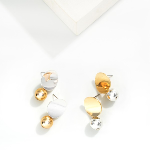 Metal Tone Disc Post Drop Earring Linked With Metal Ball Dangle Detail 

- Approximately 1" L 