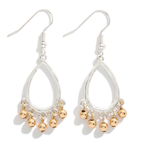 Metal Tone Textured Wire Teardrop Hoop Earring Featuring Metal Ball Bead Dangle Detail 

- Approximately 2" L 