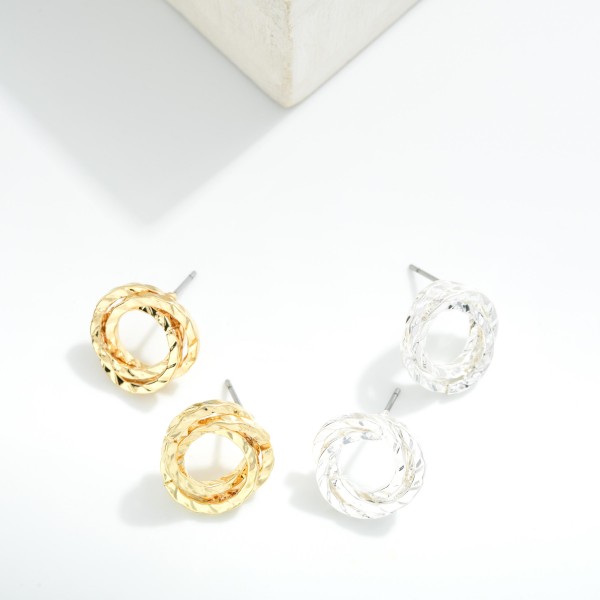 Metal Tone Twisted Stud Earring 

- Approximately .5" D