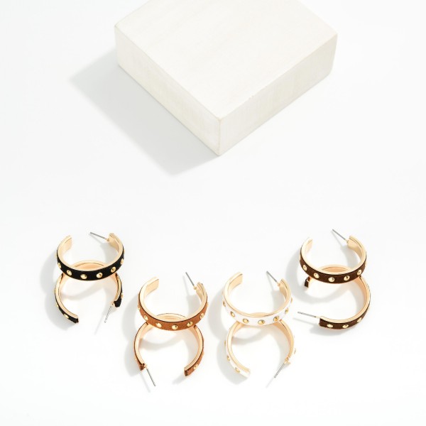 Metal Tone Leather Hoop Drop Earrings Featuring Gold Tones 

- Approximately 1" D 