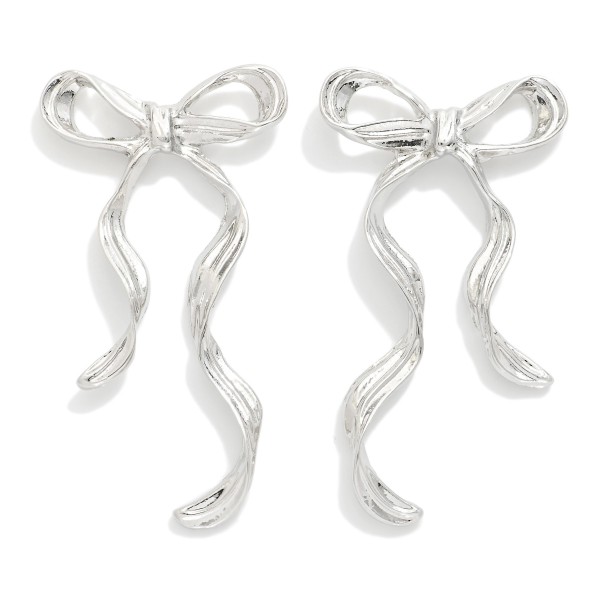 Textured Metal Long Bow Earrings 
- Approximately 2" L