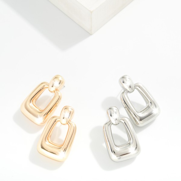 Metal Tone Door Knocker Rectangular Hoop Drop Earring

- Approximately 1.5" L silve r