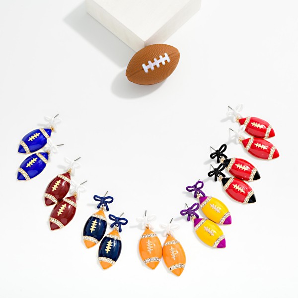 3D Enamel Football & Bow Post Drop Earrings With Rhinestone Details 

- Approximately 2" L