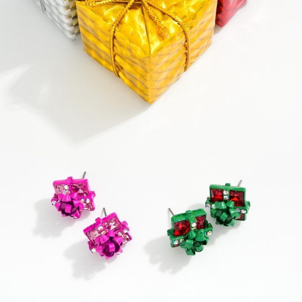 Metal Tone Present Stud Post Drop Earring Featuring Rhinestones & Metal Bow 

- Approximately .5" D  