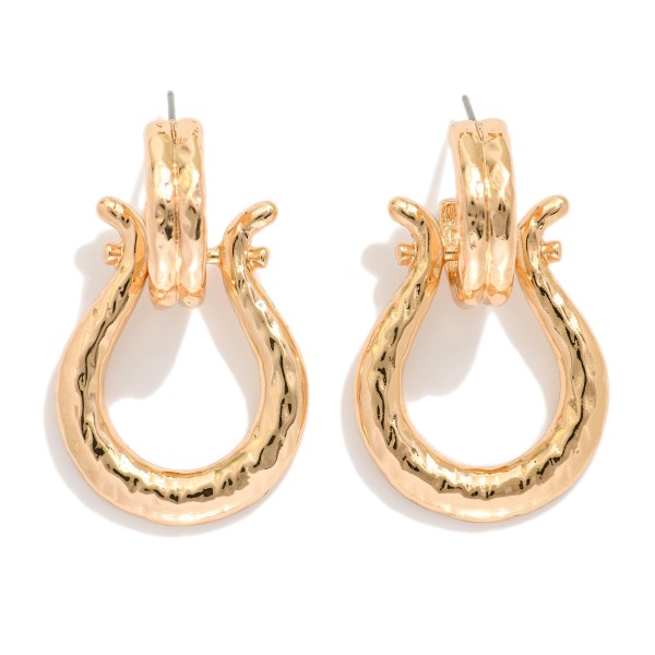 Metal Tone Circle Door Knocker Drop Earring

- Approximately 1.5" L


