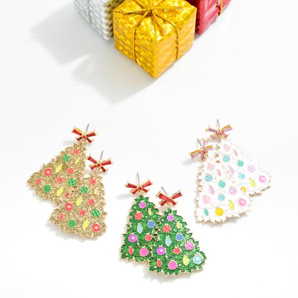Enamel Christmas Tree Earrings With Rhinestone Studded Bow Post Drop Featuring Glitter And Ornament Details 

- Approximately 2.25" L