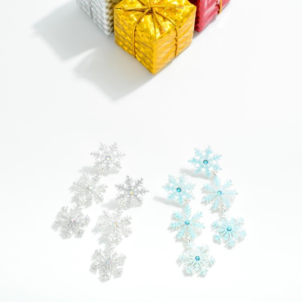 Linked Glittery Christmas Snowflake Post Drop Earrings Featuring Rhinestones

- Approximately 2" L

