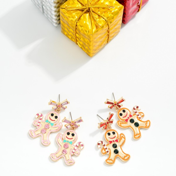 Metal Gingerbread Drop Earring Featuring Rhinestone Bow Post Drop 

- Approximately 1.75" L

