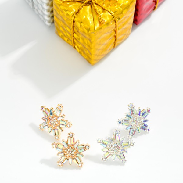 Metal Tone Rhinestone Encrusted Metal Snowflake Post Drop Earrings
- Approximately 1" D