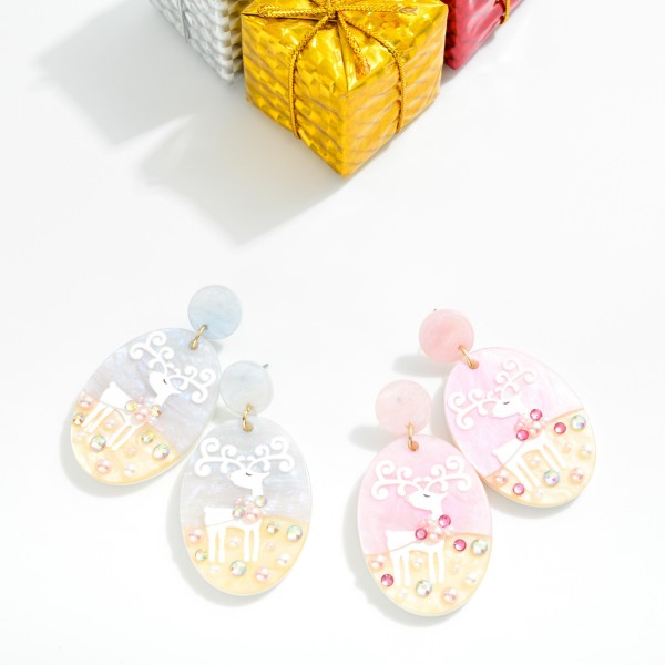 Enamel Reindeer Chunky Glitter Acetate Oval Post Drop Earrings Featuring Rhinestone & Pearl Detail

- Approximately 2.5" L

