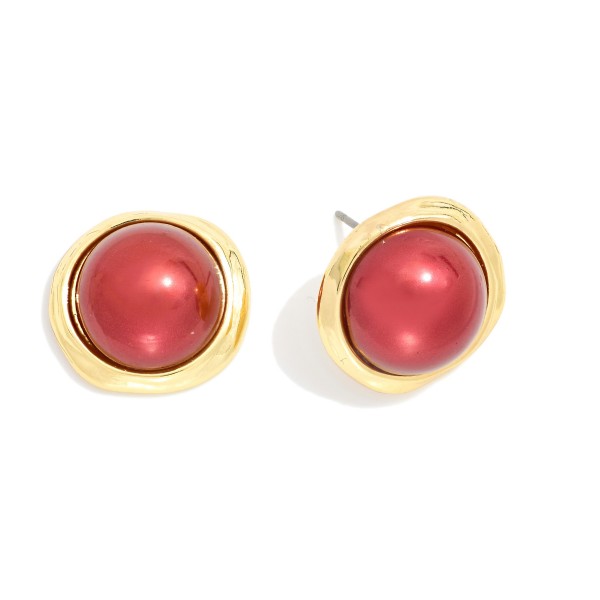 Metal Tone Post Stud Earrings Featuring Metallic Ball And Gold Tone Frame

- Approximately .75" D


