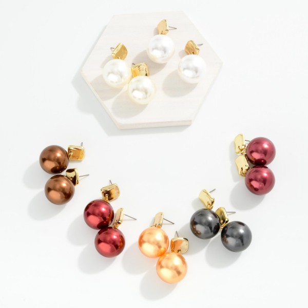 Metal Tone Squared Post Drop Earring Featuring Metallic Ball 

- Approximately 1.5" L 