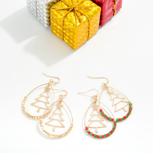 Beaded Teardrop Earrings Featuring Metal Tone Christmas Tree Detail 

- Approximately 2" L