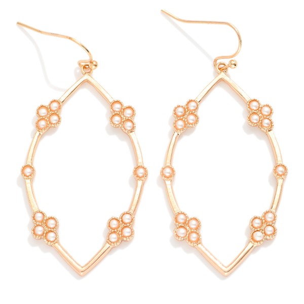 Metal Tone Leaf Shape Drop Earrings Featuring Pearl Cluster Details

- Approximately 1.5" L
