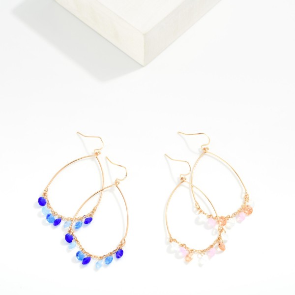 Metal Tone Wire Half Oval Drop Earring With Linked Rhinestone Dangle Details 

- Approximately 2" L 