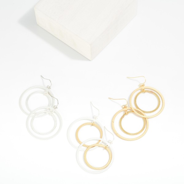 Nesting Textured Metal Hoop Drop Earrings 

- Approximately 1.25" L