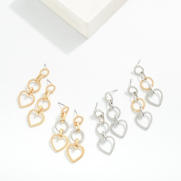 Twisted Linked Metal Circle Featuring Heart 

- Approximately 2" L 