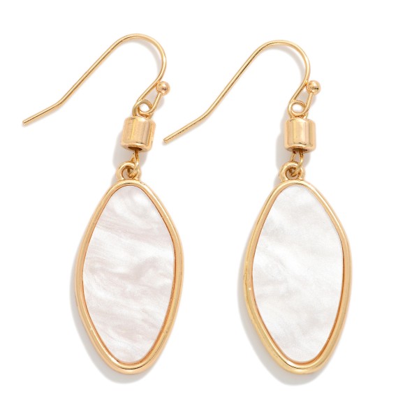 Metal Tone Oval Drop Earrings Featuring Pearl

- Approximately 2" L

