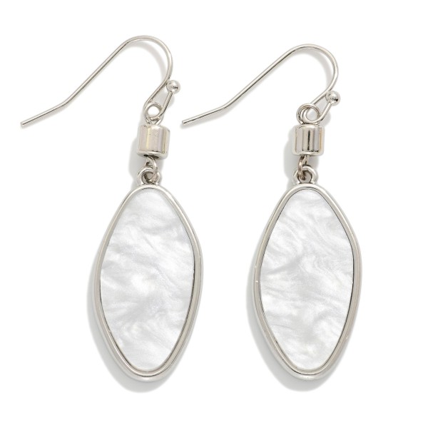 Metal Tone Oval Drop Earrings Featuring Pearl

- Approximately 2" L

