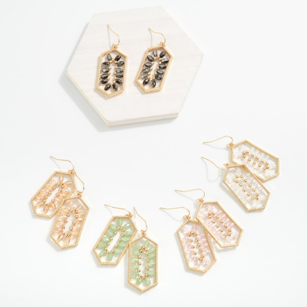 Metal Tone Hexagonal Shaped Drop Earrings Featuring Faceted beads & Gold Tone Beads In A symmetrical Pattern 

- Approximately 2" L 