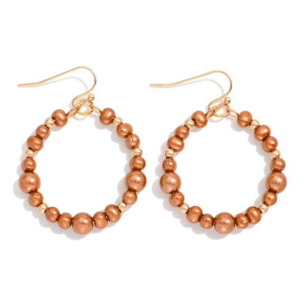 Metallic Beaded Hoop Drop Earring Featuring Metal Tone Bead Stations 

- Approximately 1.75" L 