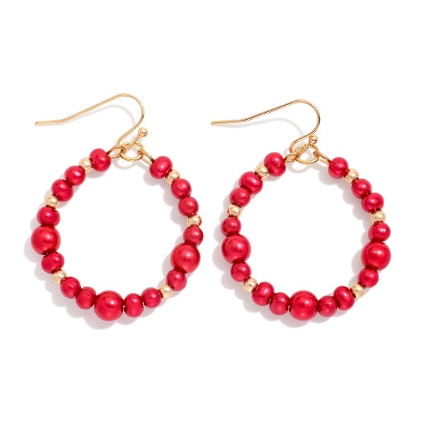 Metallic Beaded Hoop Drop Earring Featuring Metal Tone Bead Stations 

- Approximately 1.75" L 