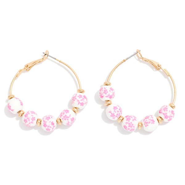 Metal Tone Hoop Drop Earring Featuring Chinoiserie Flower Beads & Gold Tone Disc Bead Stations 

- Approximately 1.5" D 
- Gold Dipped 