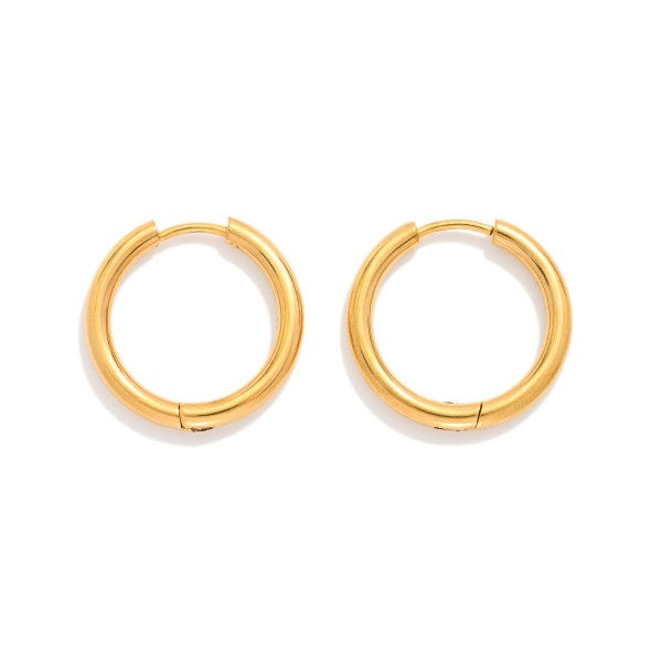 Metal Tone Huggie Hoop Earrings

- Approximately .75" D
- Hypoallergenic 
- Water Resistant 
