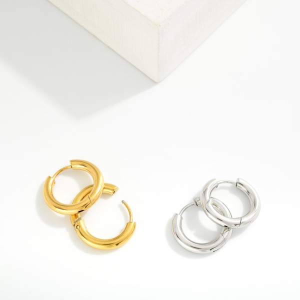 Metal Tone Hinged Huggie Hoop Earrings 

- Approximately .5" D