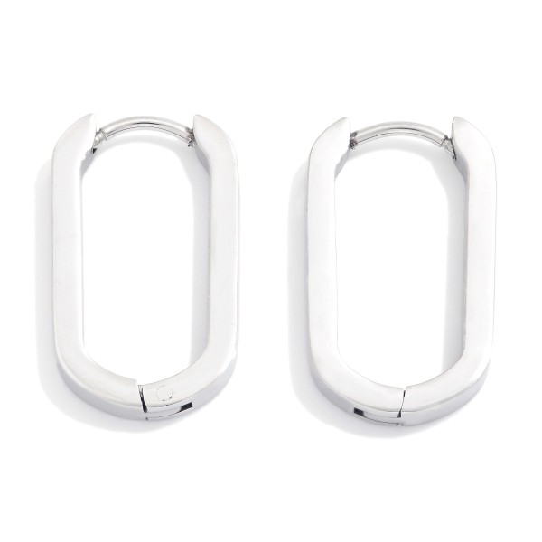 Metal Tone Oval Hinged Hoop Earrings 

- Stainless Steel
- Water Resistant
- Approximately 1" L
