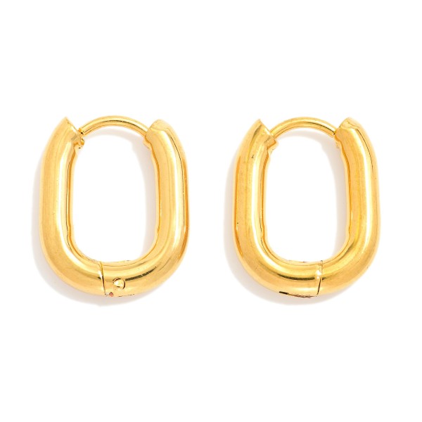 Metal Tone Oval Hinged Huggie Hoop Earrings 

- Stainless Steel
- Water Resistant
- Approximately .25" D