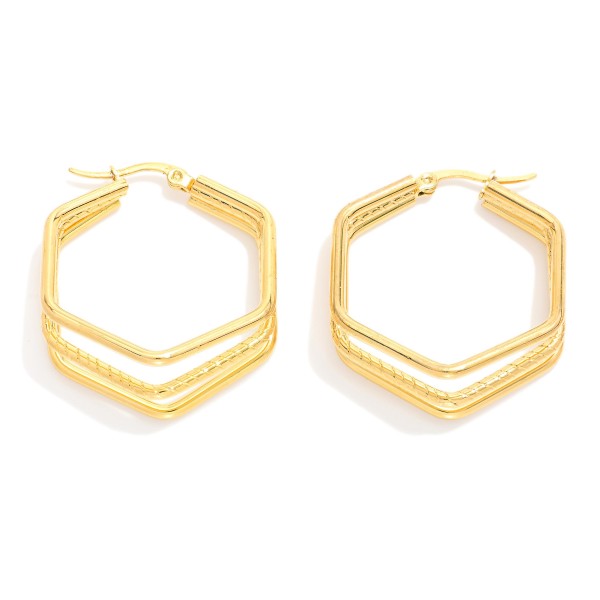 Layered Gold Hexagon Hoop Earrings 

- Stainless Steel
- Water Resistant
- Approximately 1" D
