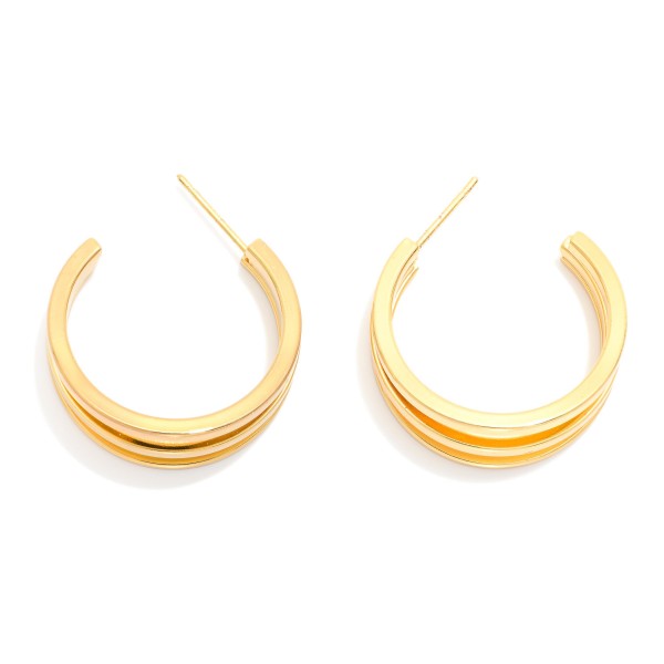 Layered Tapered Metal Hoop Earrings 

- Stainless Steel
- Water Resistant
- Approximately .75" D