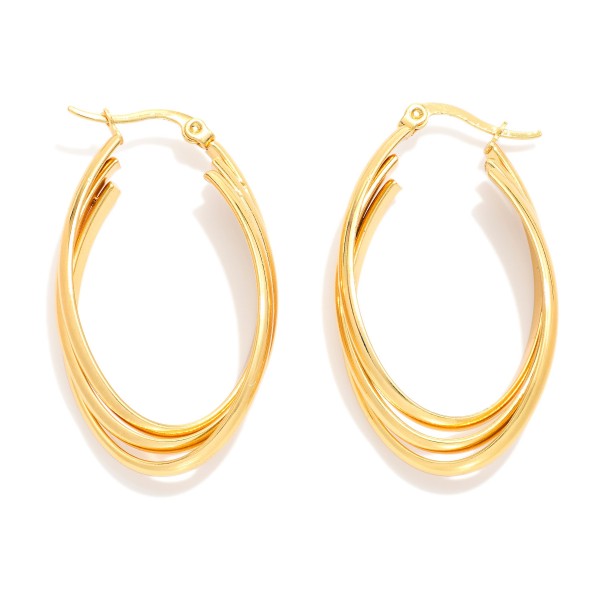 Layered Metal Tone Oval Hoop Earrings

- Stainless Steel
- Water Resistant
- Approximately 1" D
